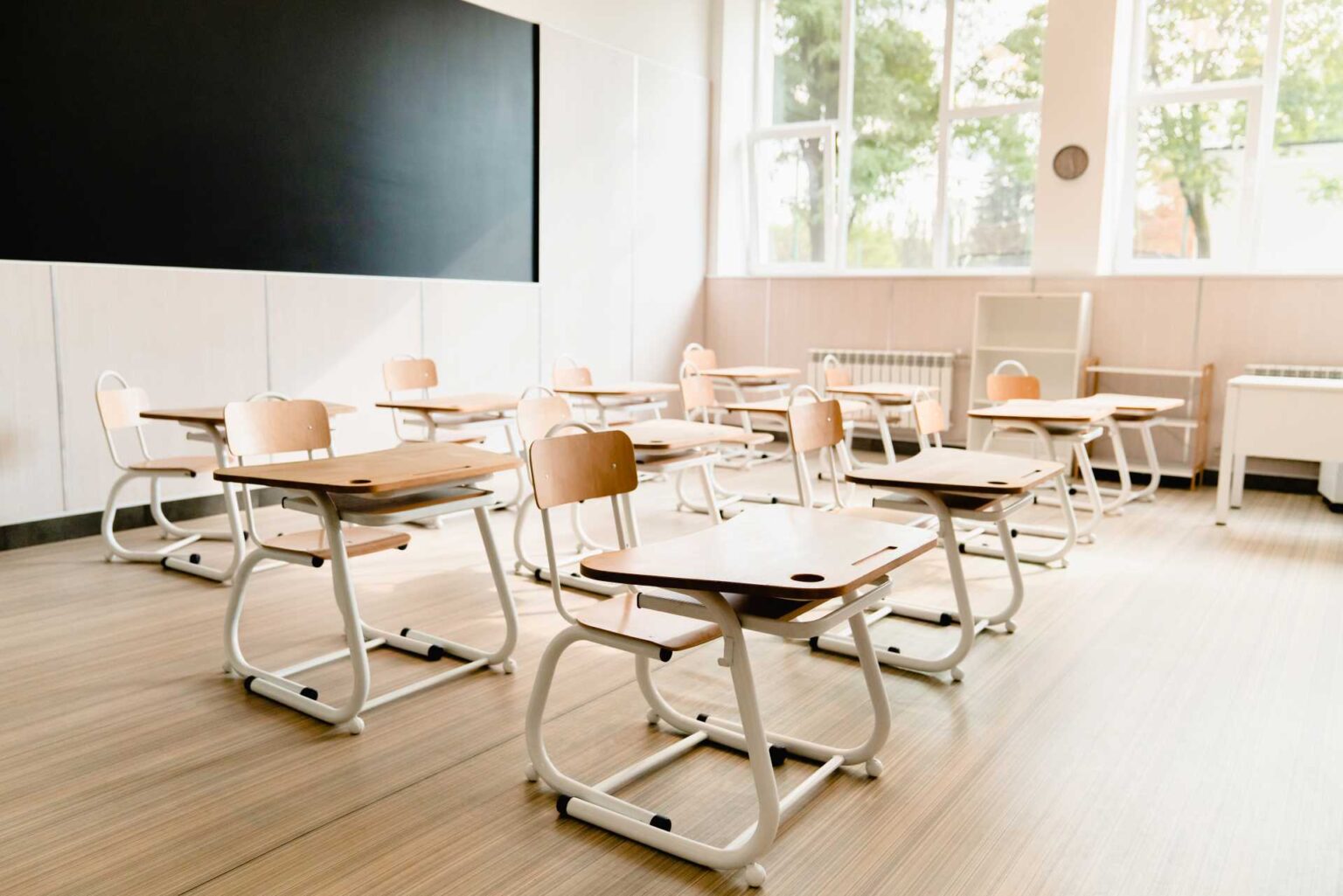 Modern empty classroom | Featured Image for the Commercial Cleaning Company Home Page of QCS Cleaning.